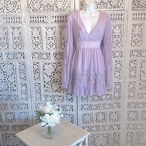 Lilac colored short dress.